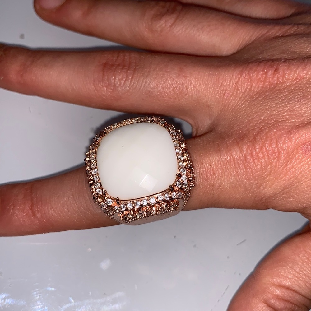 Adjustable rose gold toned large ring with faux white gem and rhinestones